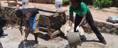A volunteer helping to build a school at her Building Project placement A Projects Abroad volunteer helping to build a school at her Spring Break Building Project